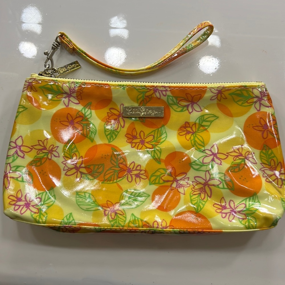 Lilly Pulitzer yellow and orange floral print wristlet